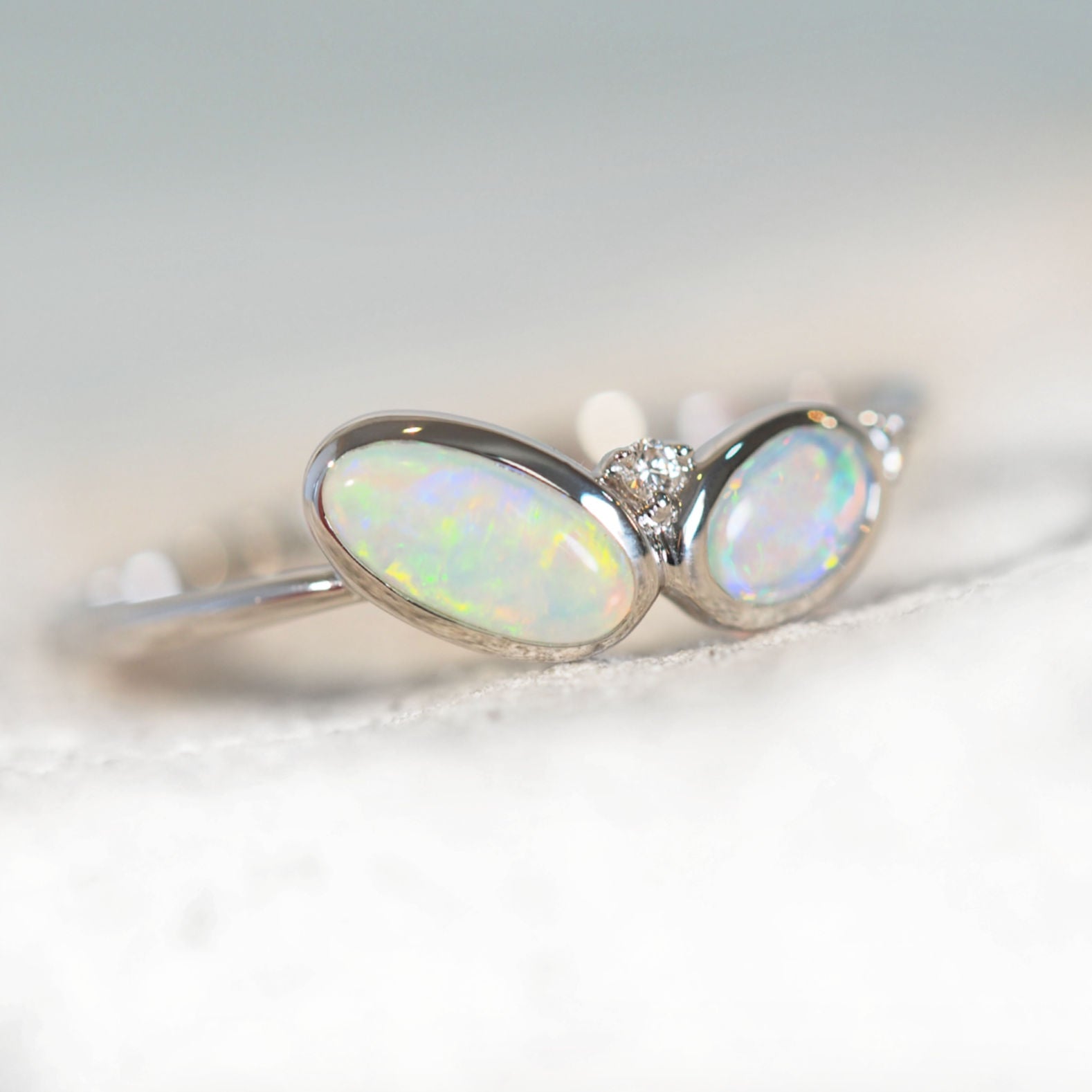 crystal opal ring set with diamonds