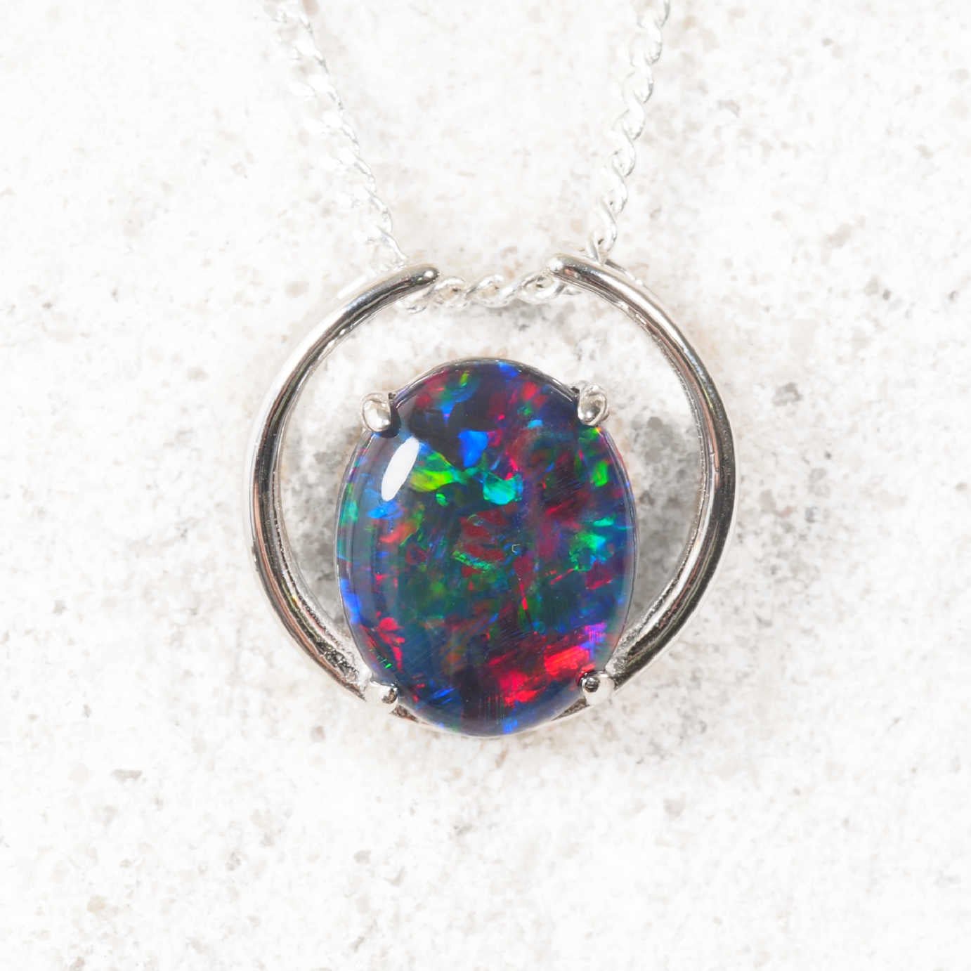 Elana’ sterling silver open circle opal pendant featuring oval Australian triplet opal