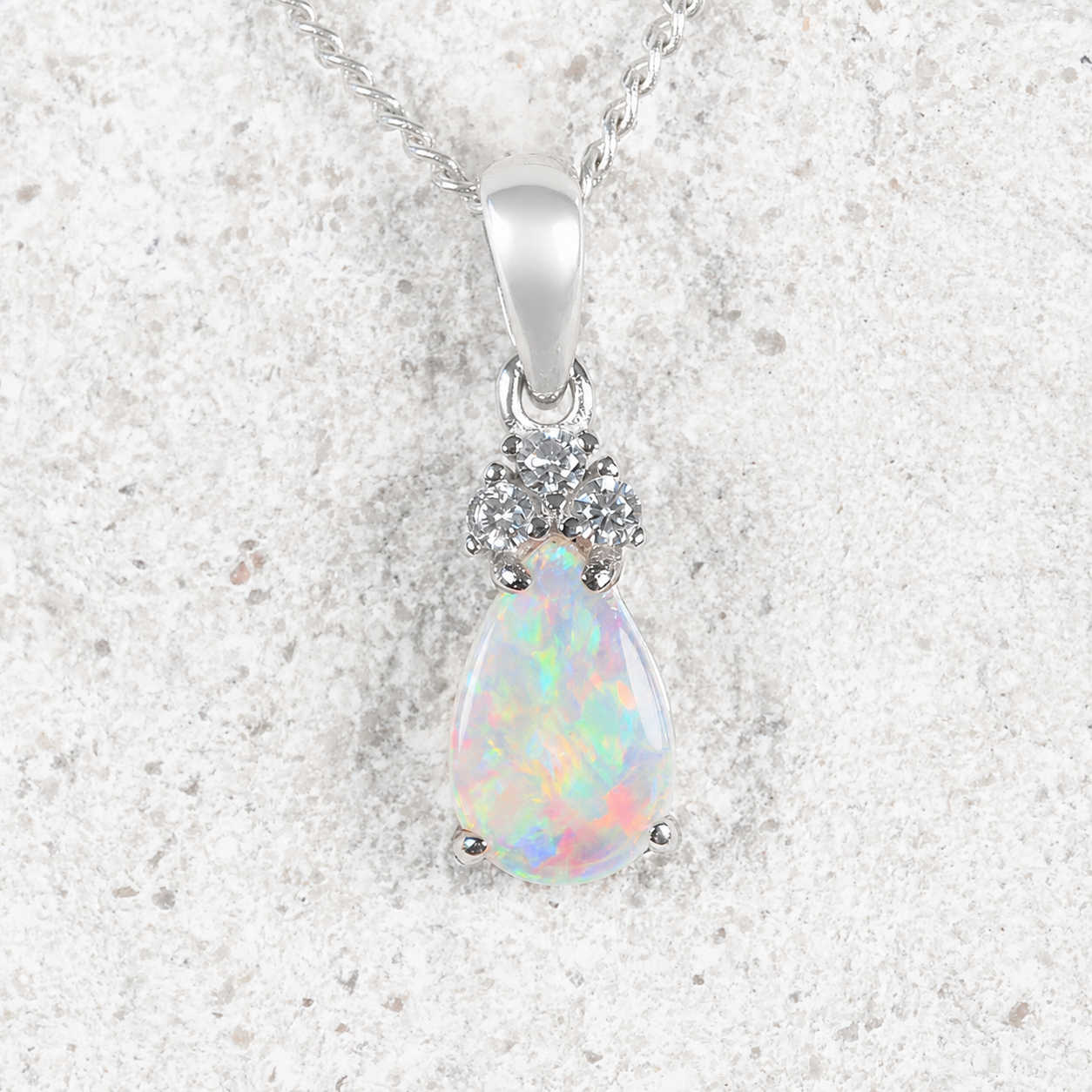 Silver opal pendant with multi-colour opal stone and three diamantes