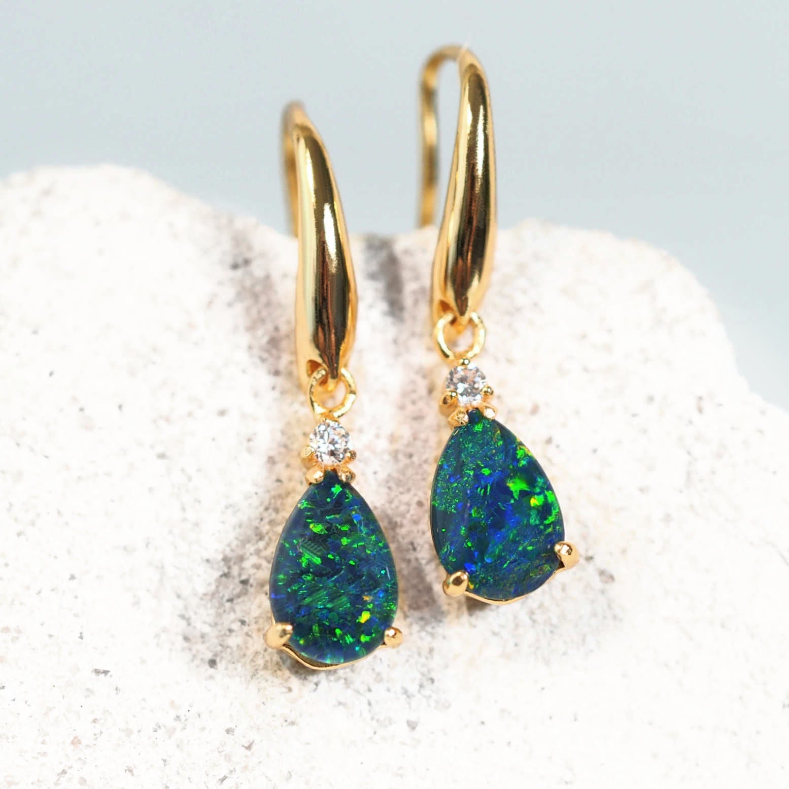 green and blue triplet opal earrings set in gold plated silver