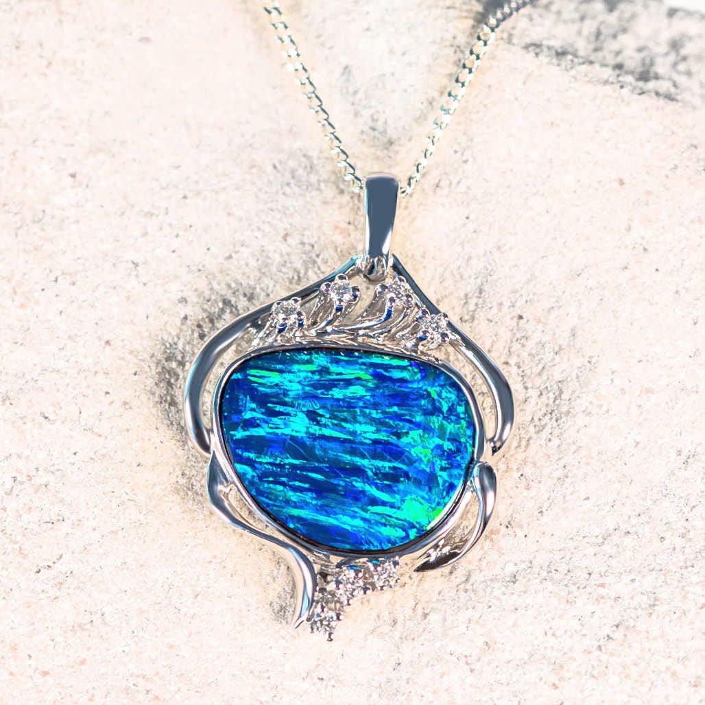 blue and green doublet opal pendant set in white gold