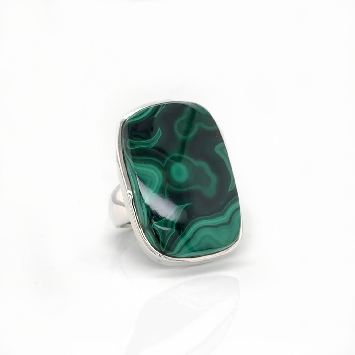Modern silver ring with bold rectangular Malachite showcased as a statement piece