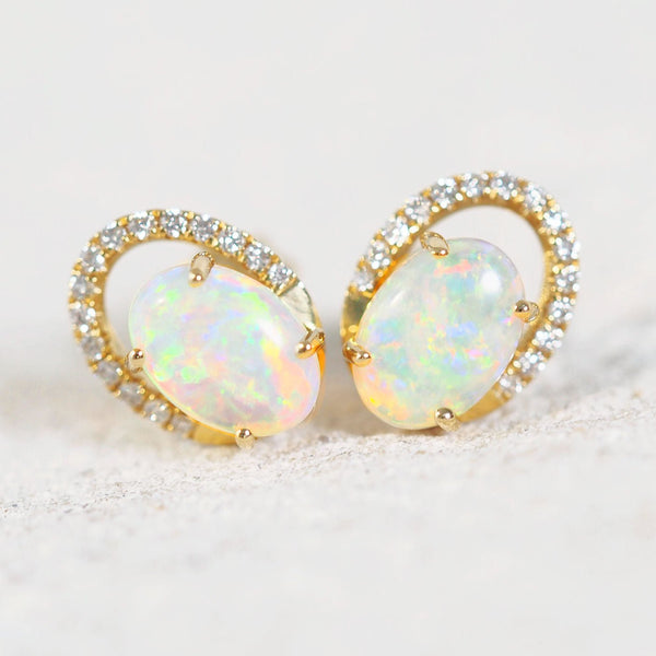 gold opal earrings in gold with diamonds