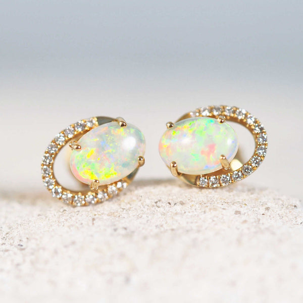 opal earrings in gold with diamonds