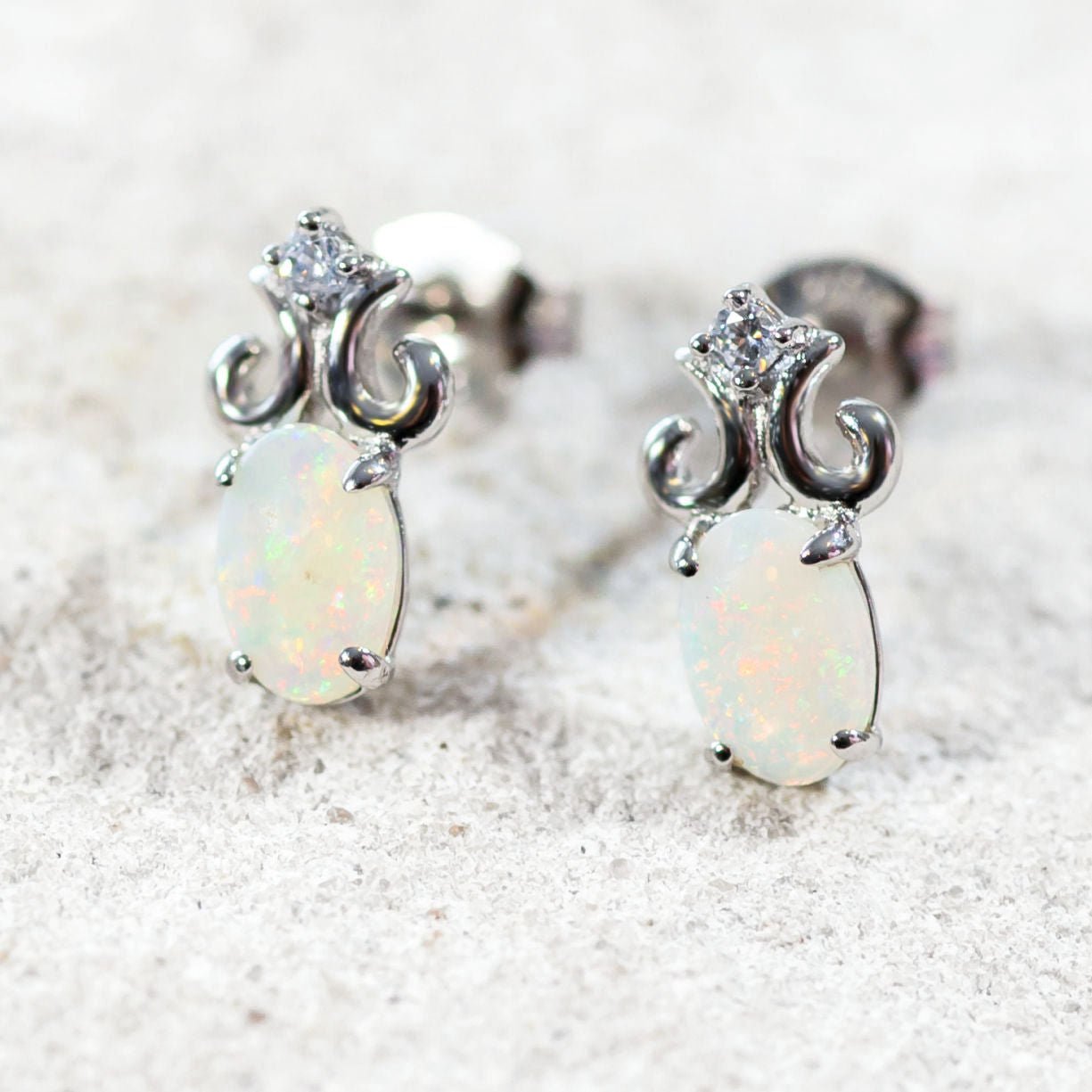 Opal earrings set in silver with colourful Australian opals and diamantes