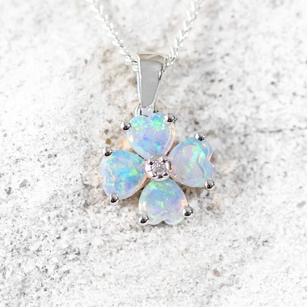 blue crystal opal pendant set in white gold