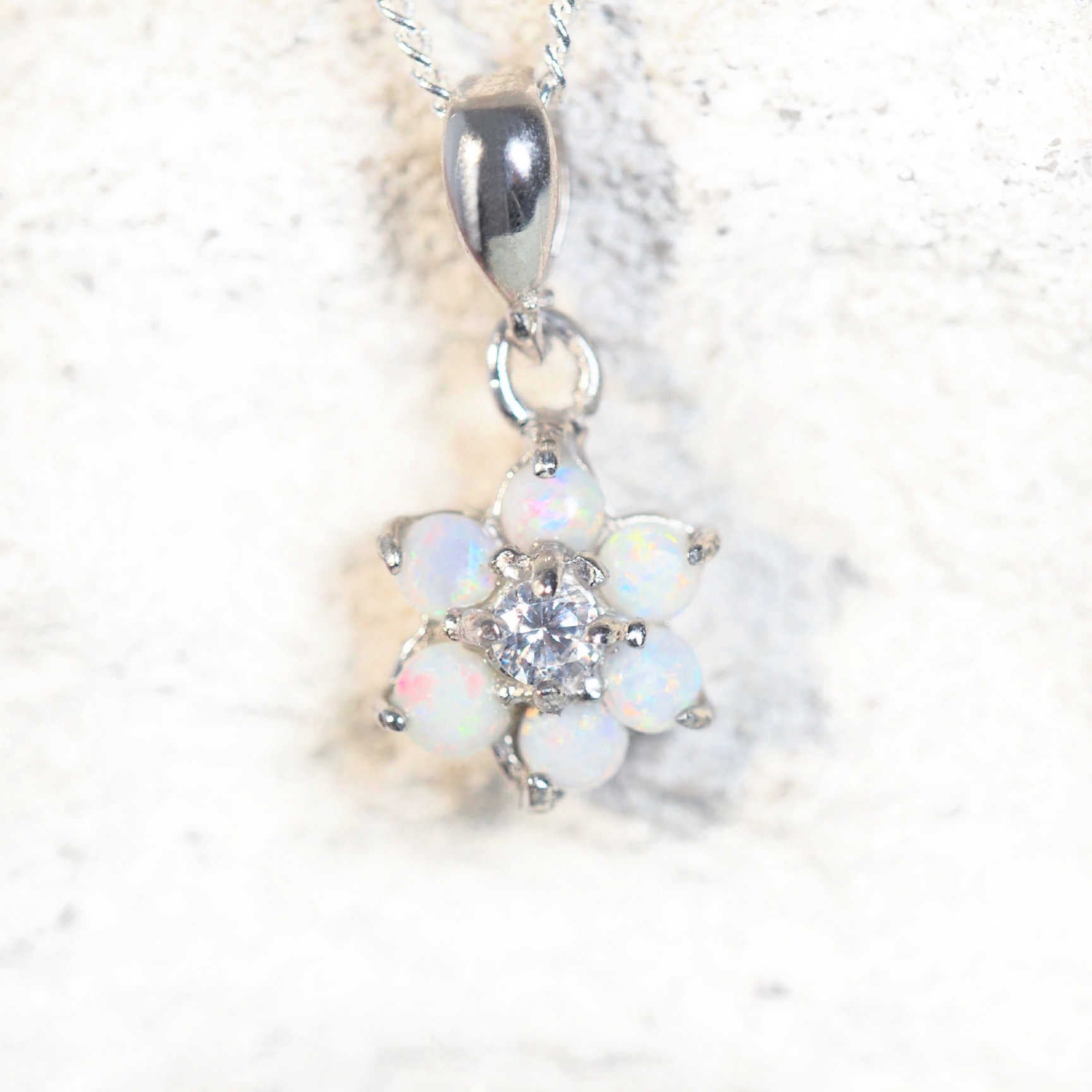 colourful opal pendant set in silver
