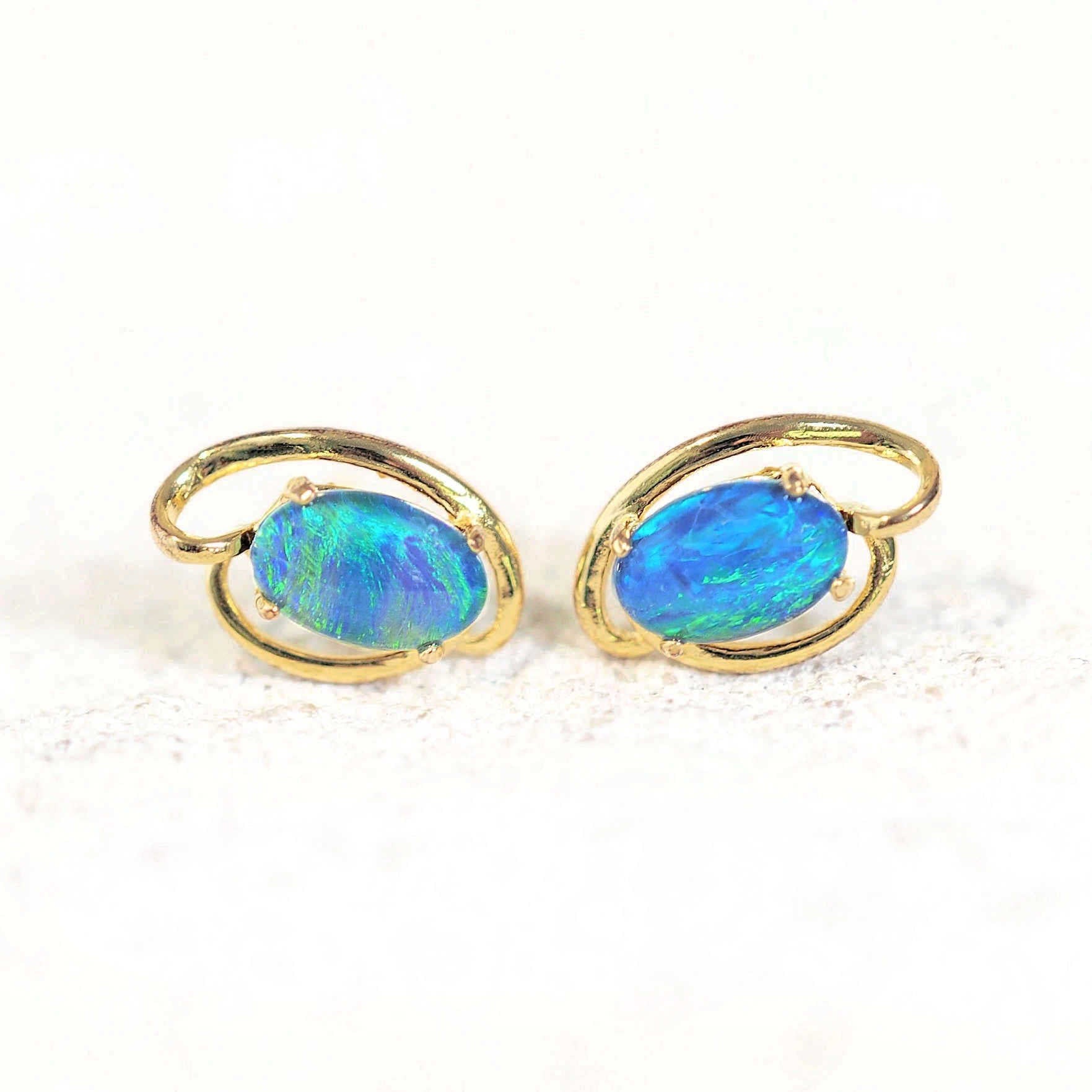 beautiful blue opal earrings set in gold plated silver