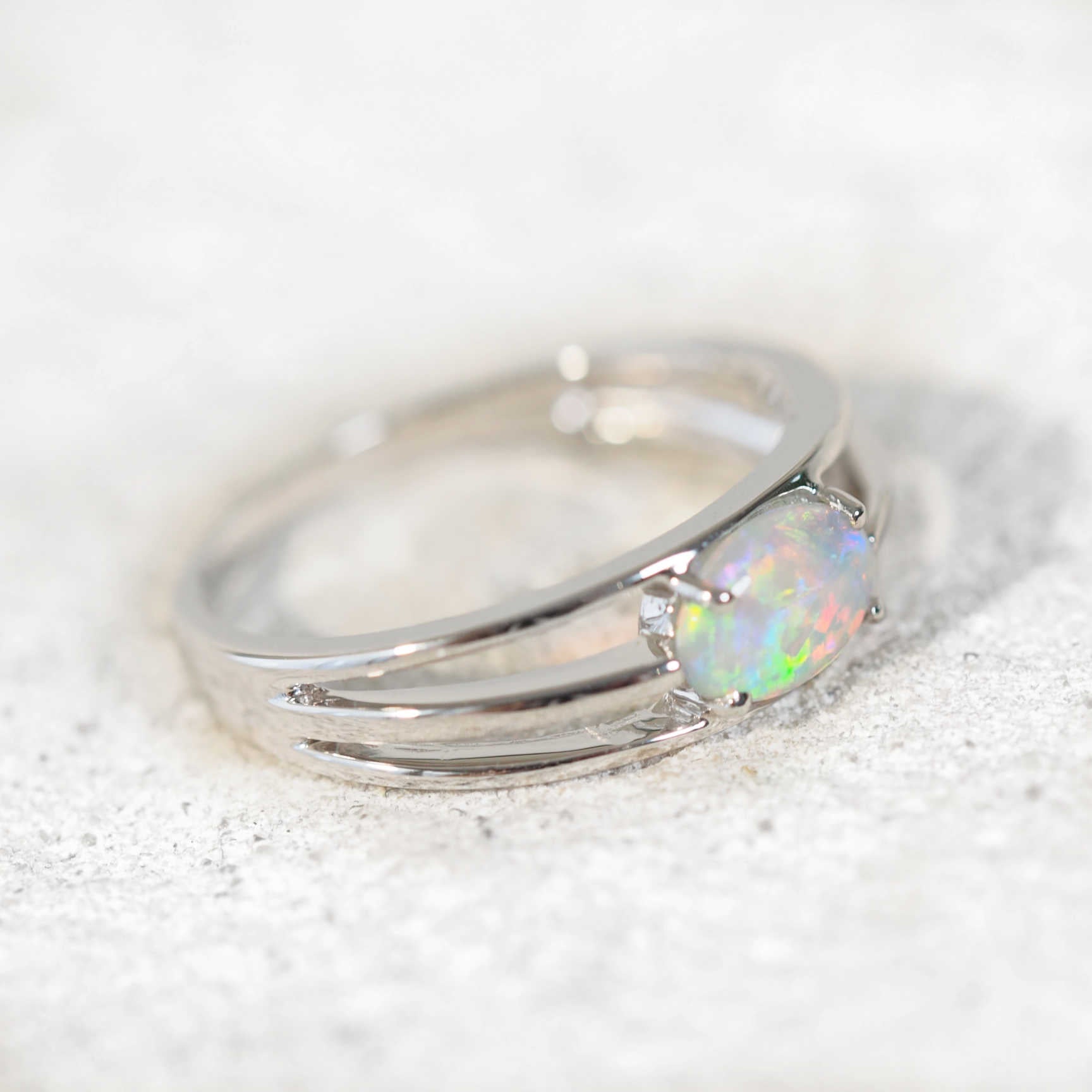 side view of crystal opal ring set in 14ct white gold