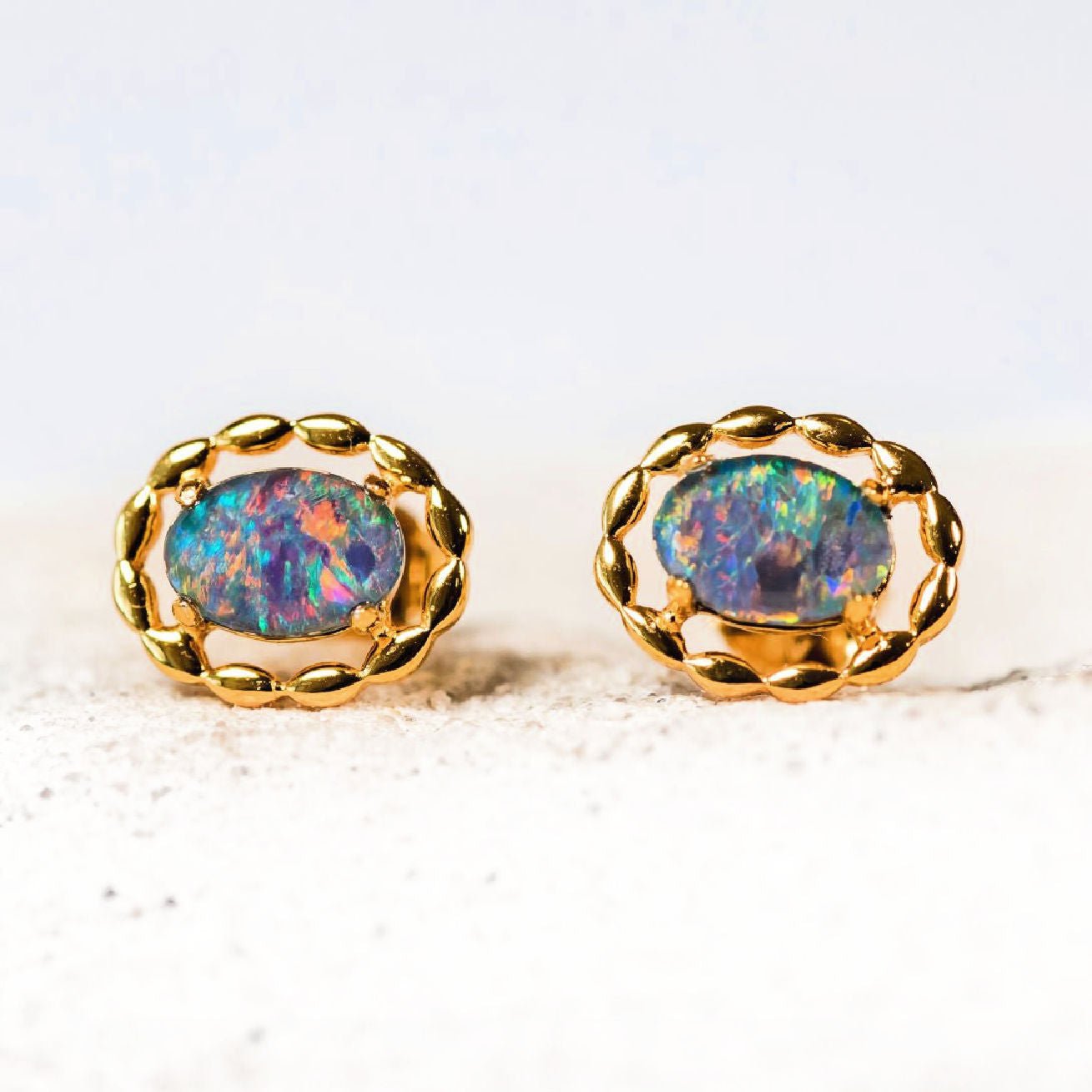colourful opal earrings set in gold plated silver
