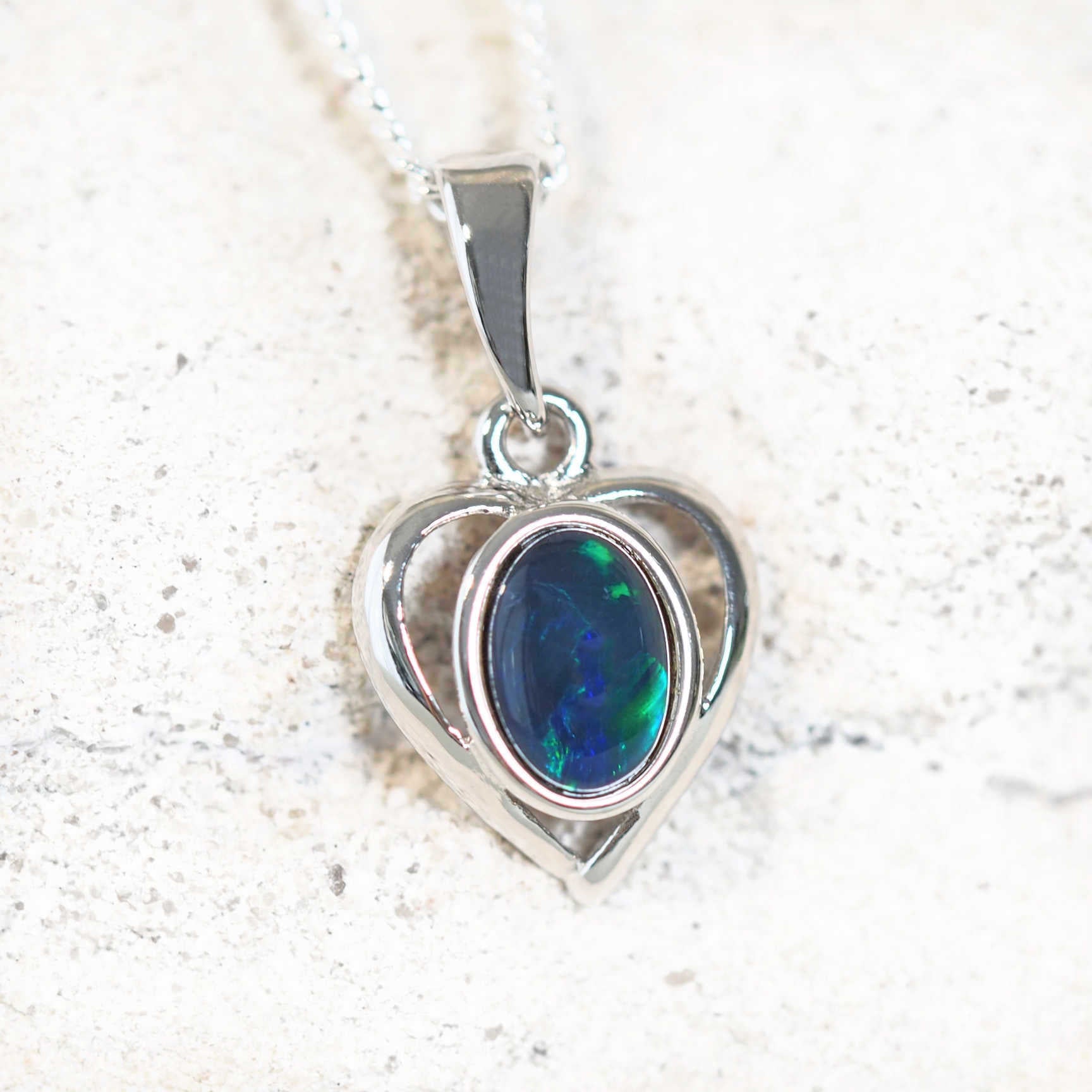 blue and green heart opal pendant