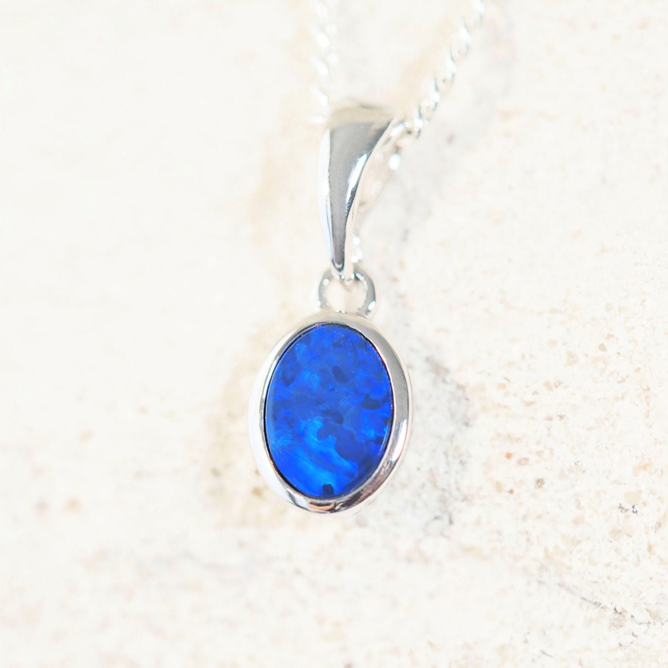 blue opal pendant in silver