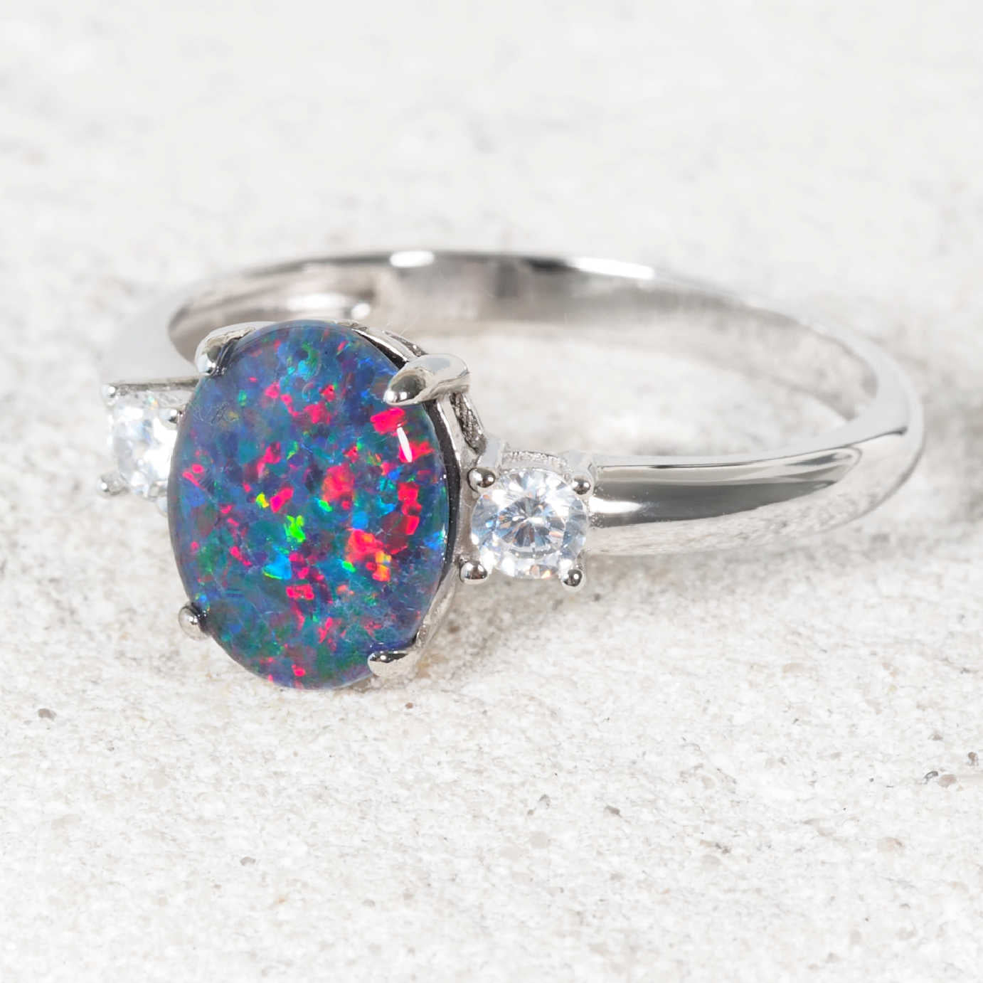 Opal ring set with a colourful Australian triplet opal