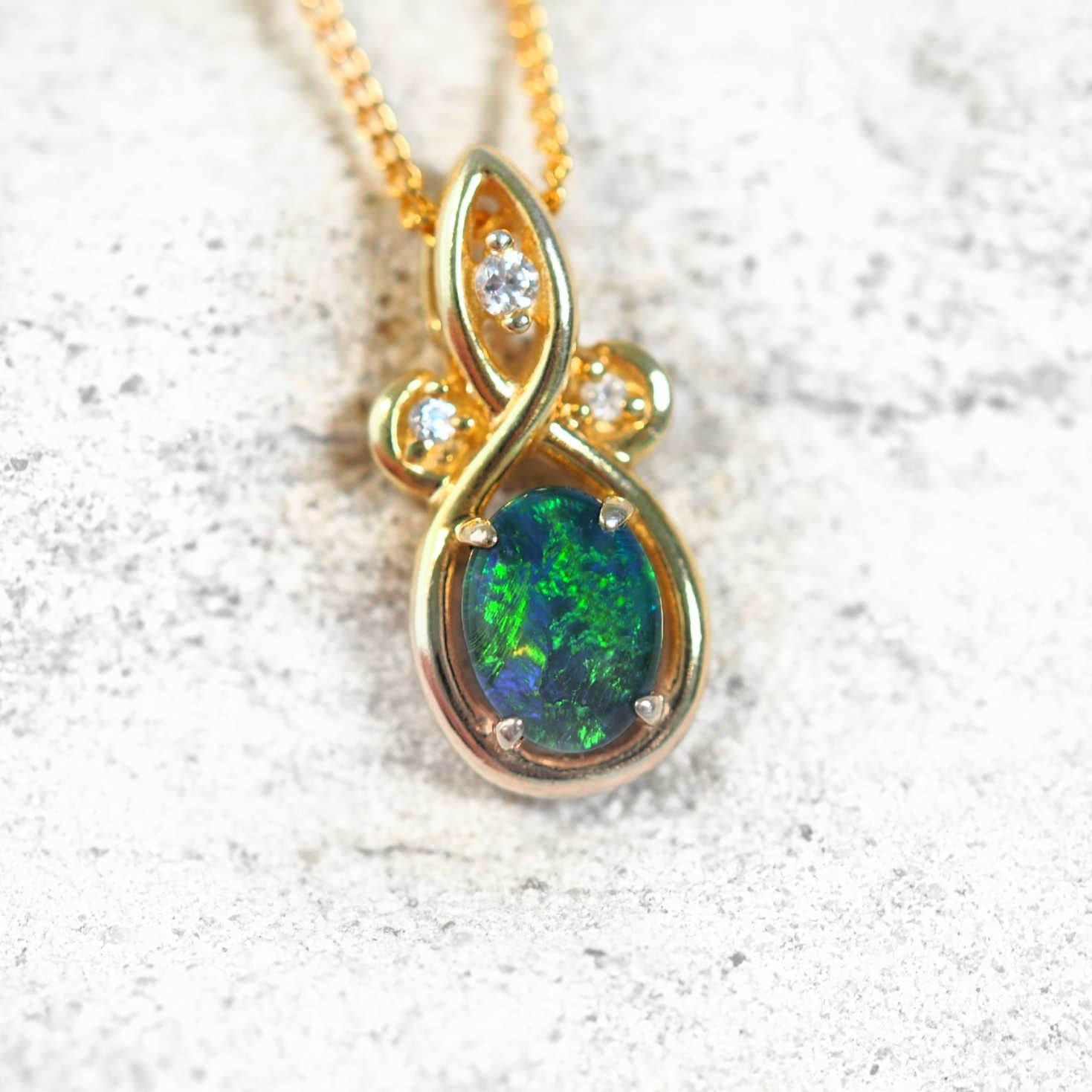 triplet opal pendant with green colour