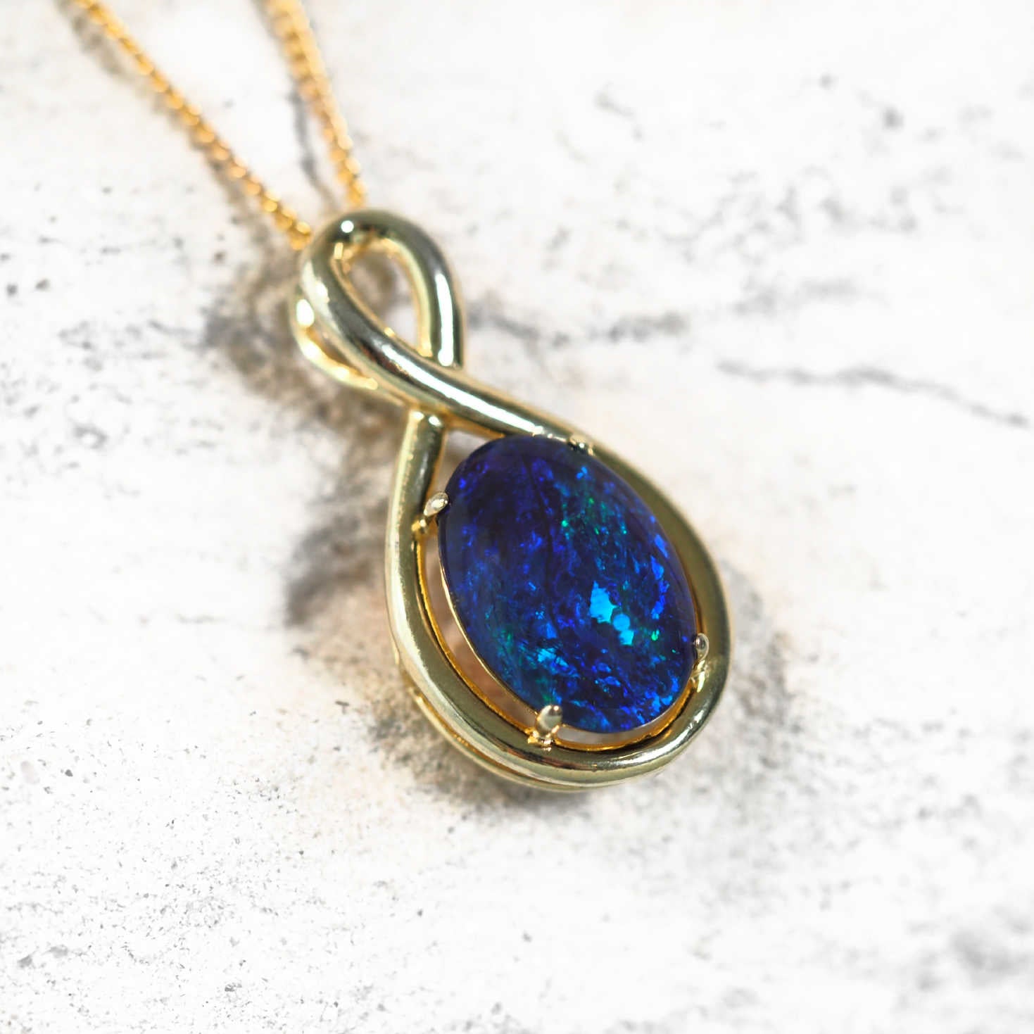 gold plated silver blue opal pendant