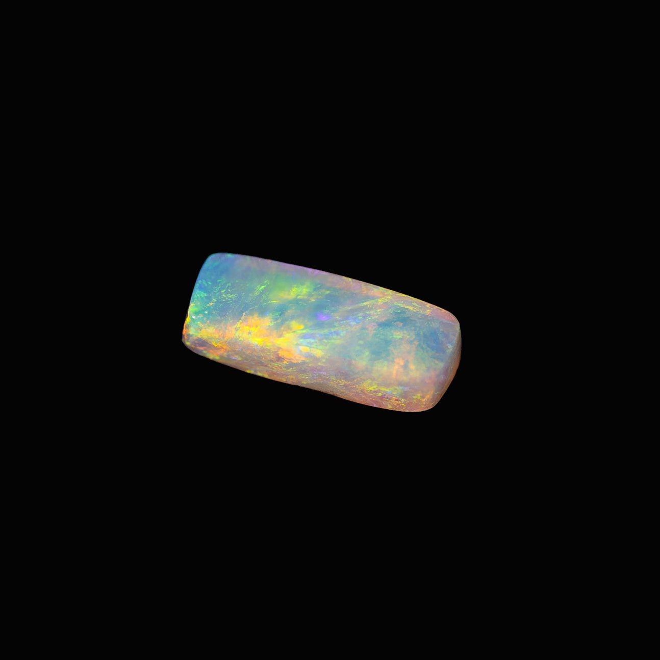 Rectangular crystal opal from Lightning Ridge with vibrant multi-colour fire