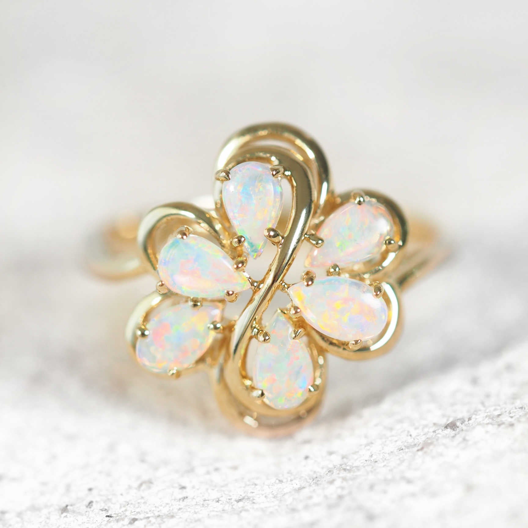 colourful opal ring with six teardrop shaped Australian solid opals