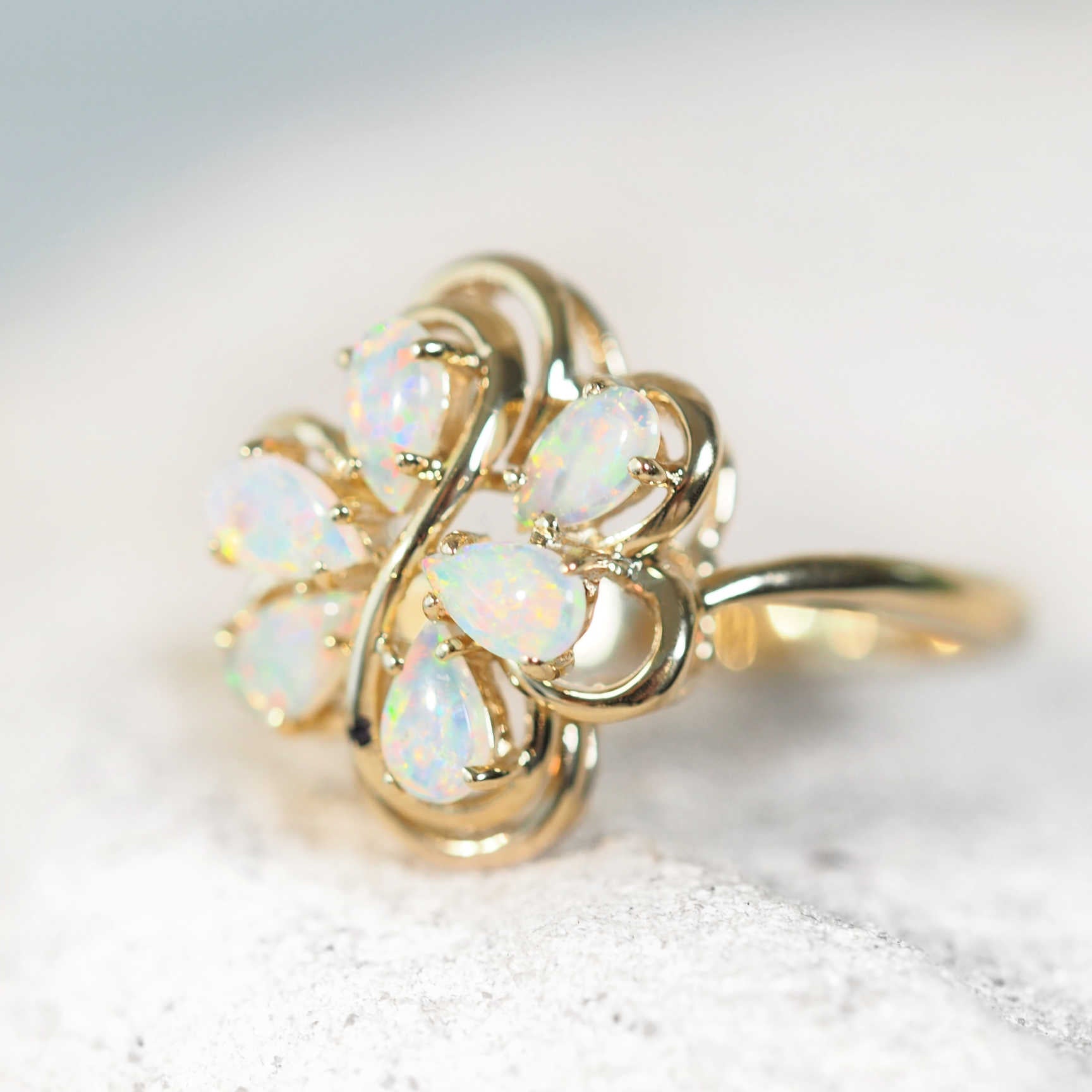 teardrop opal ring set in 14ct yellow gold