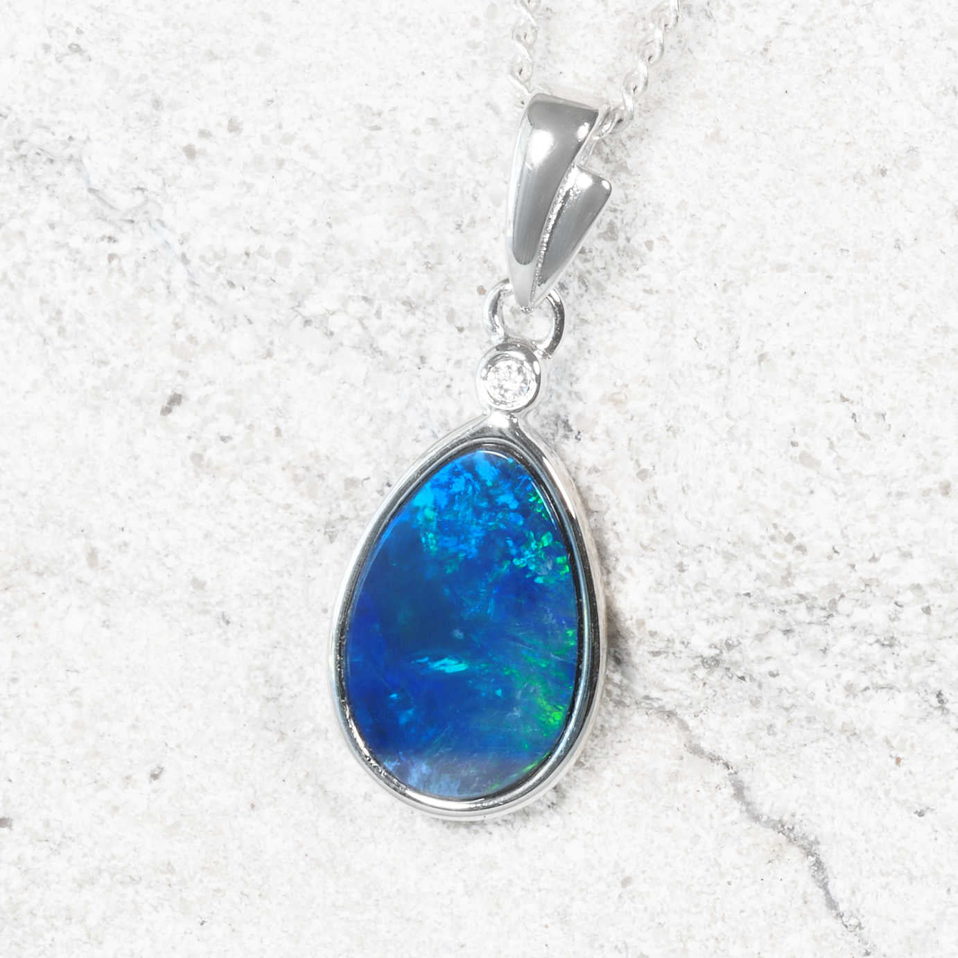 Natural Australian blue and green opal doublet necklace in sterling silver with bezel-set cubic zirconia