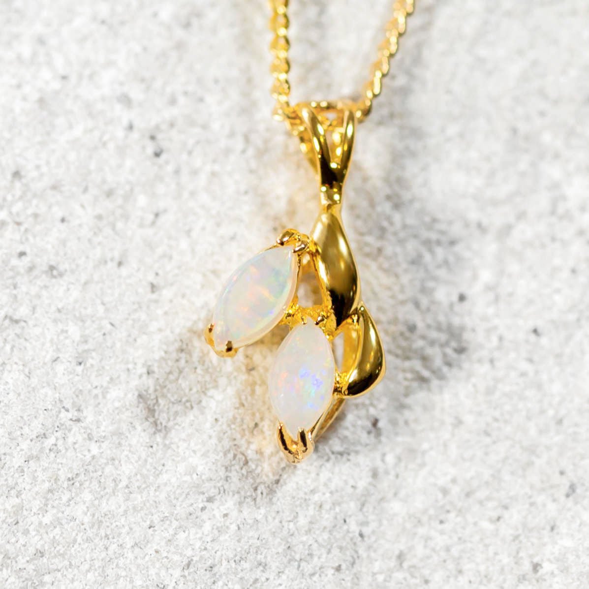 opal pendant set in gold plated silver