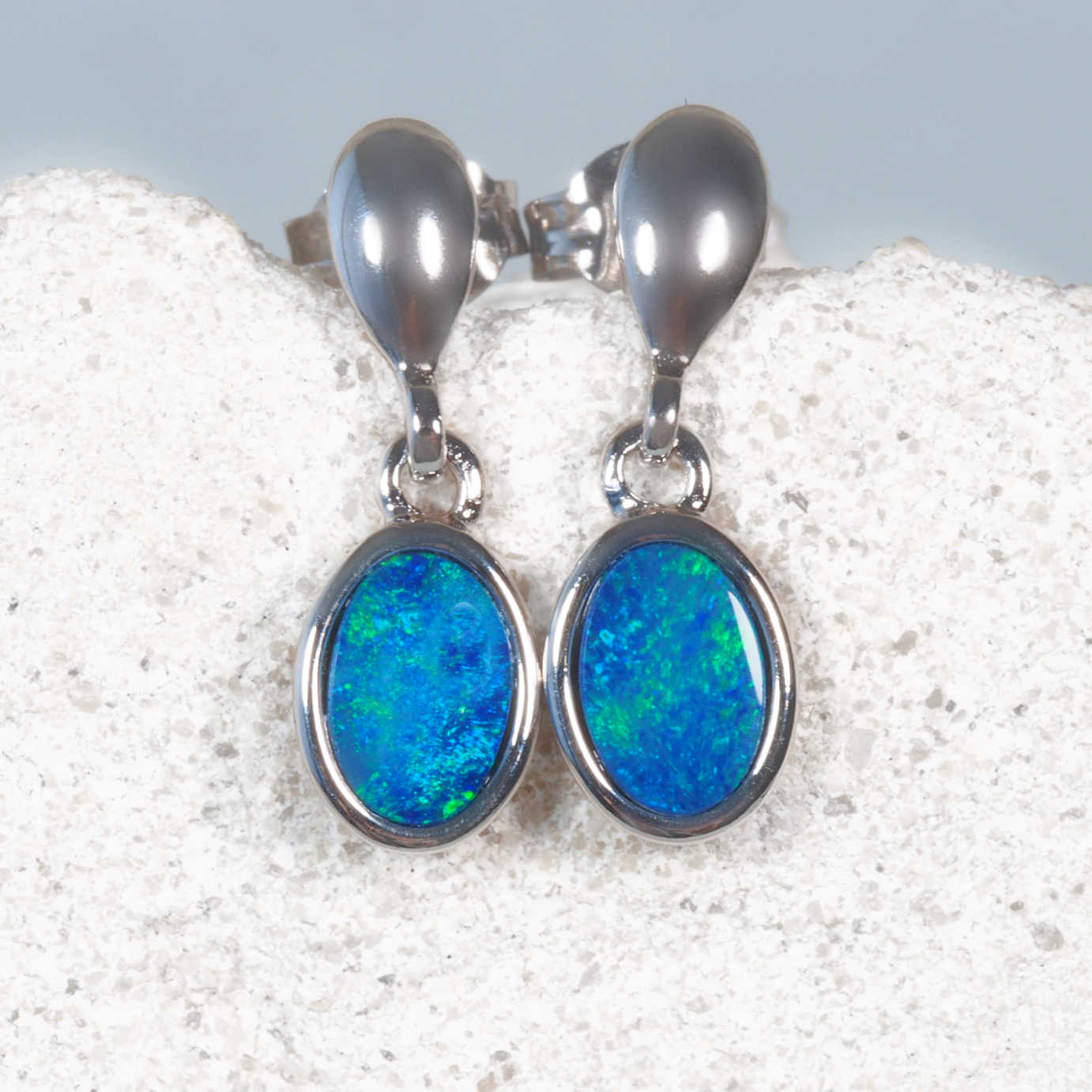 Oval Australian blue opal silver earrings with stud backings