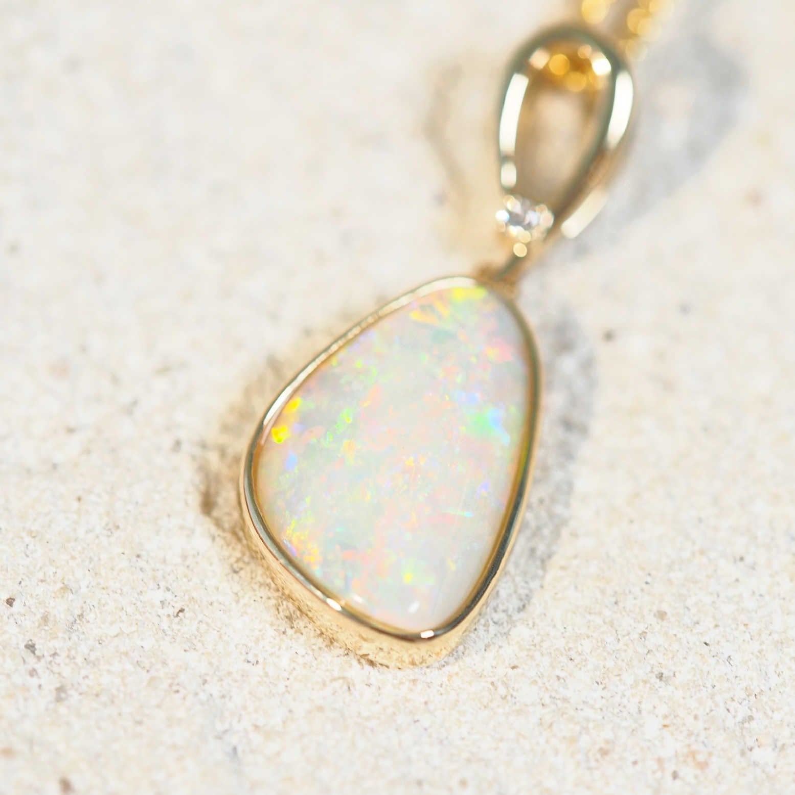 colourful opal and diamonds gold pendant