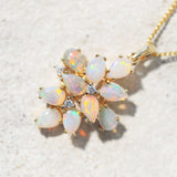 colourful australian opal necklace set in 18ct gold with three diamonds