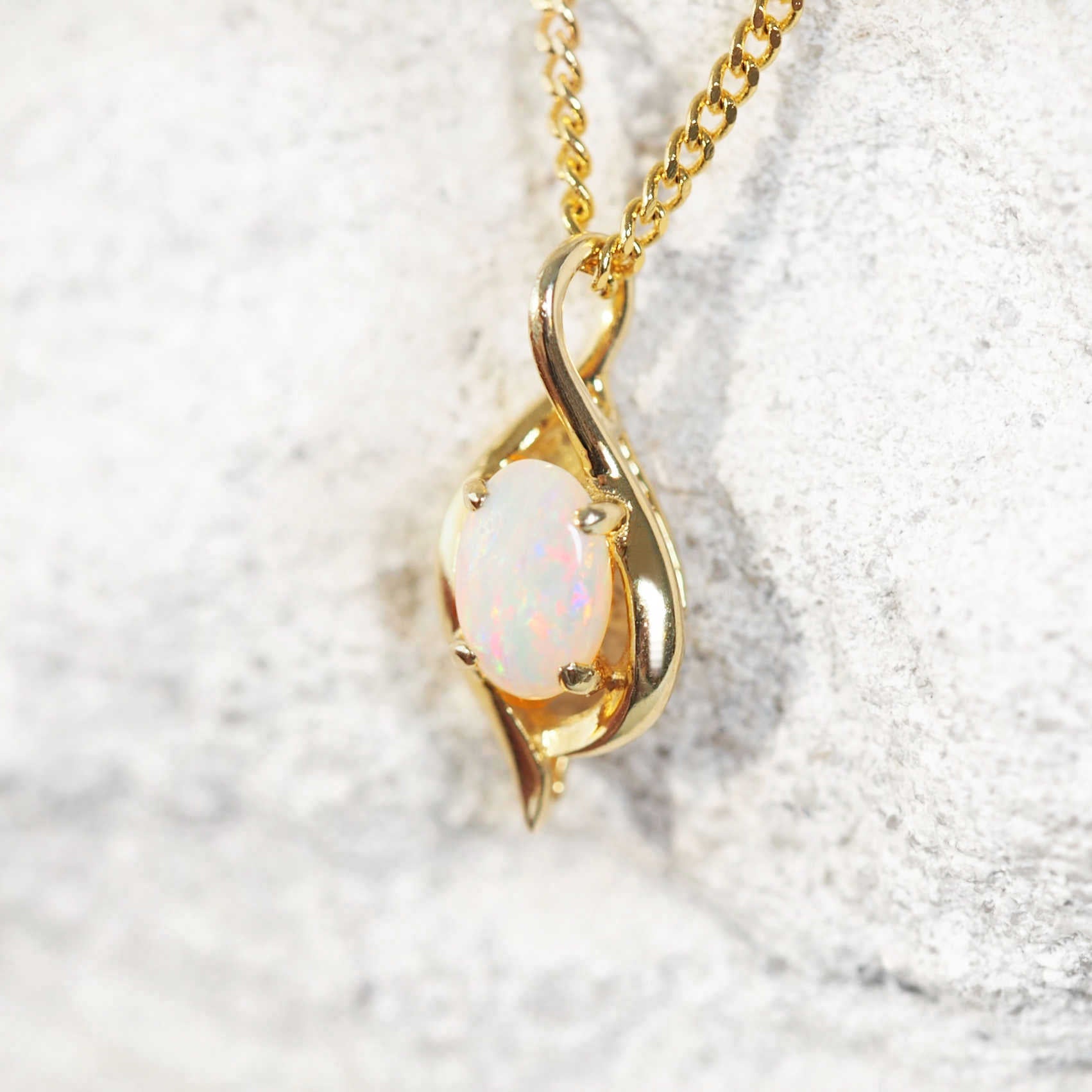 colourful and delicate opal pendant in gold plated silver