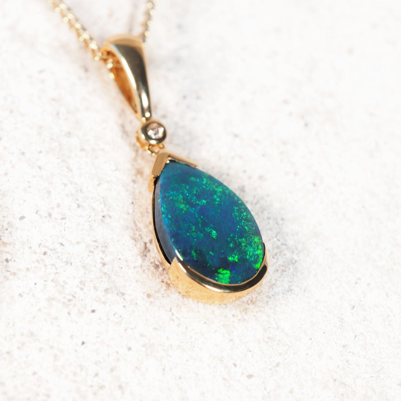 Katrina 18ct yellow gold black opal pendant with green Lightning Ridge opal