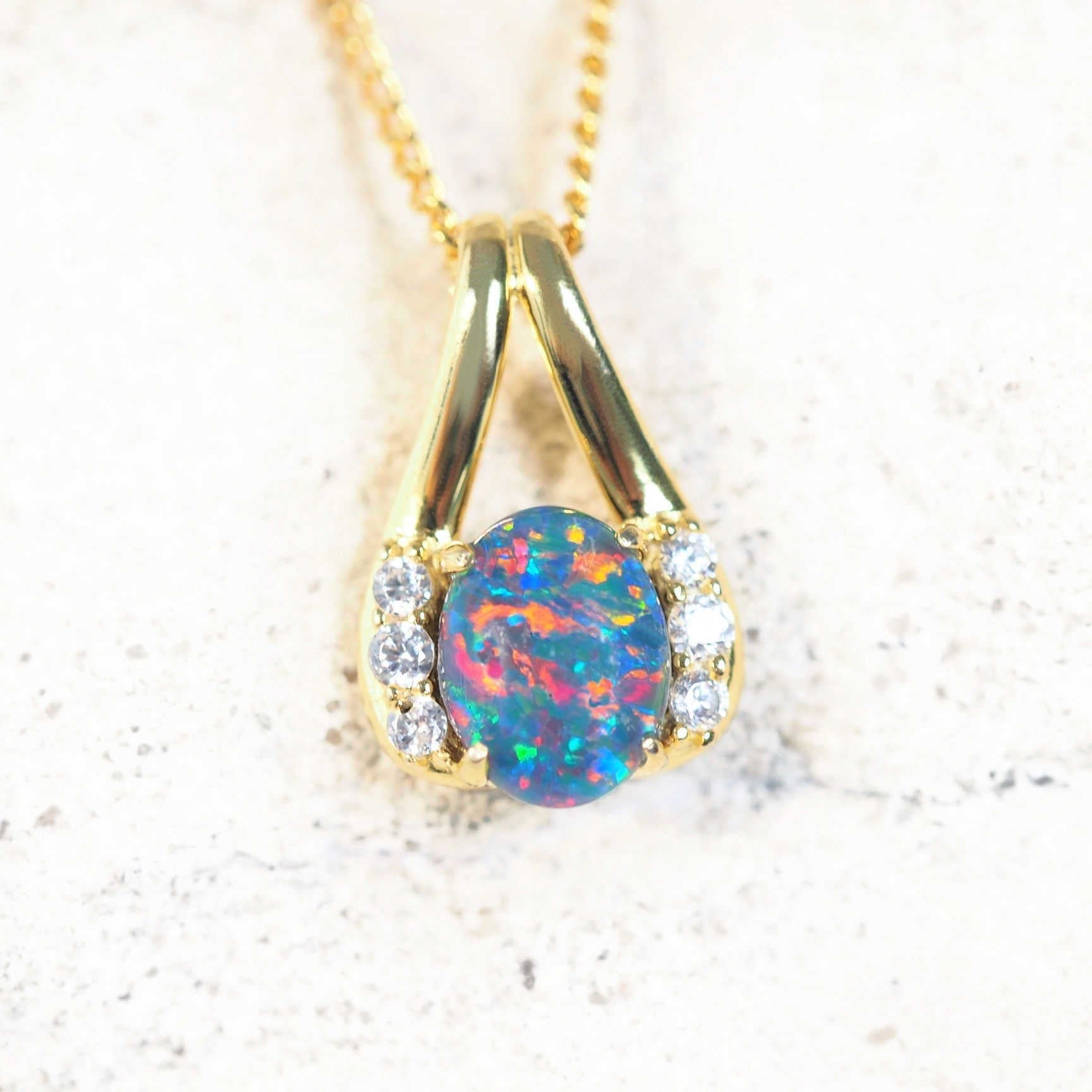 colourful opal pendant set with a colourful opal gemstone