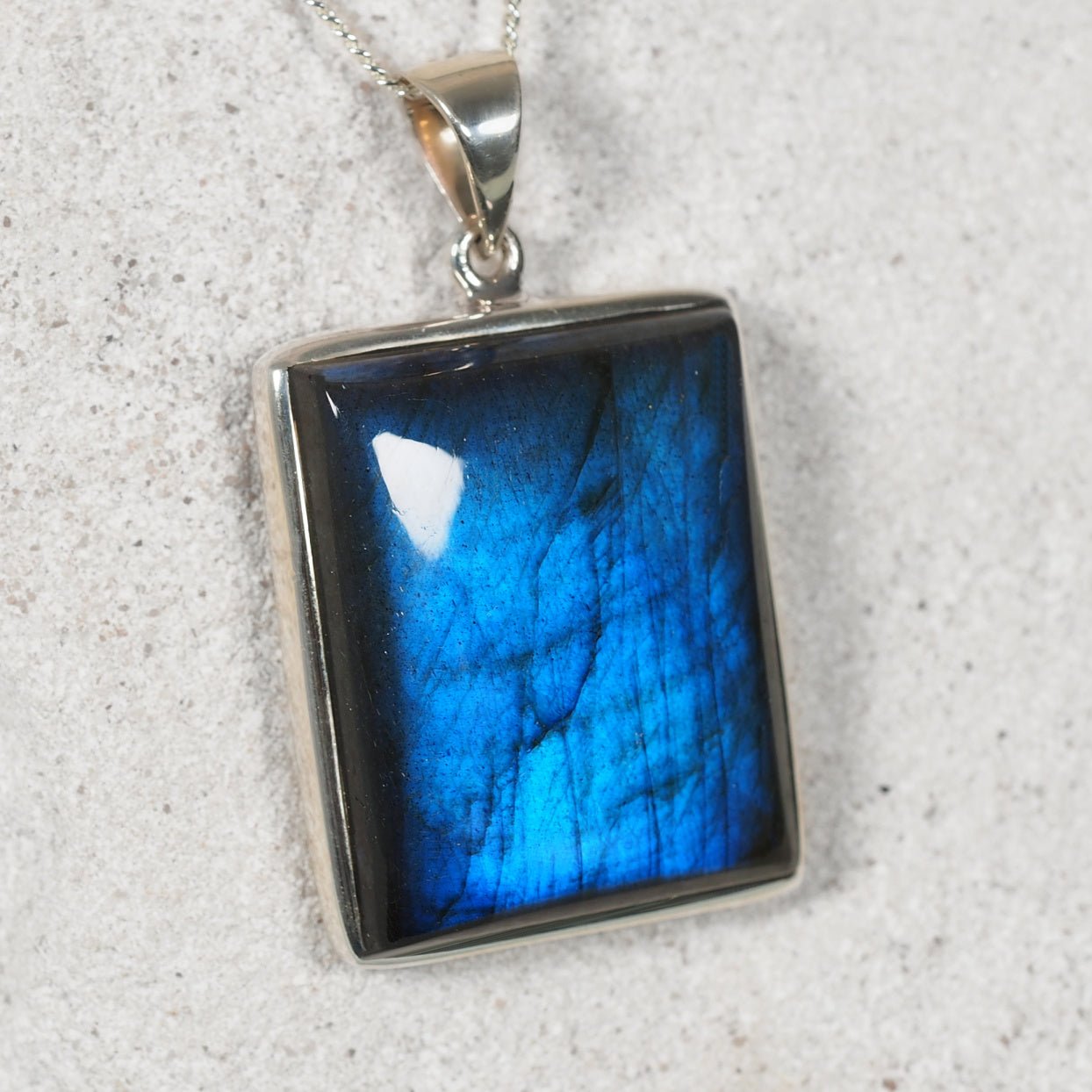 'Kia' Labradorite Silver Pendant with bright blue hues in a silver frame