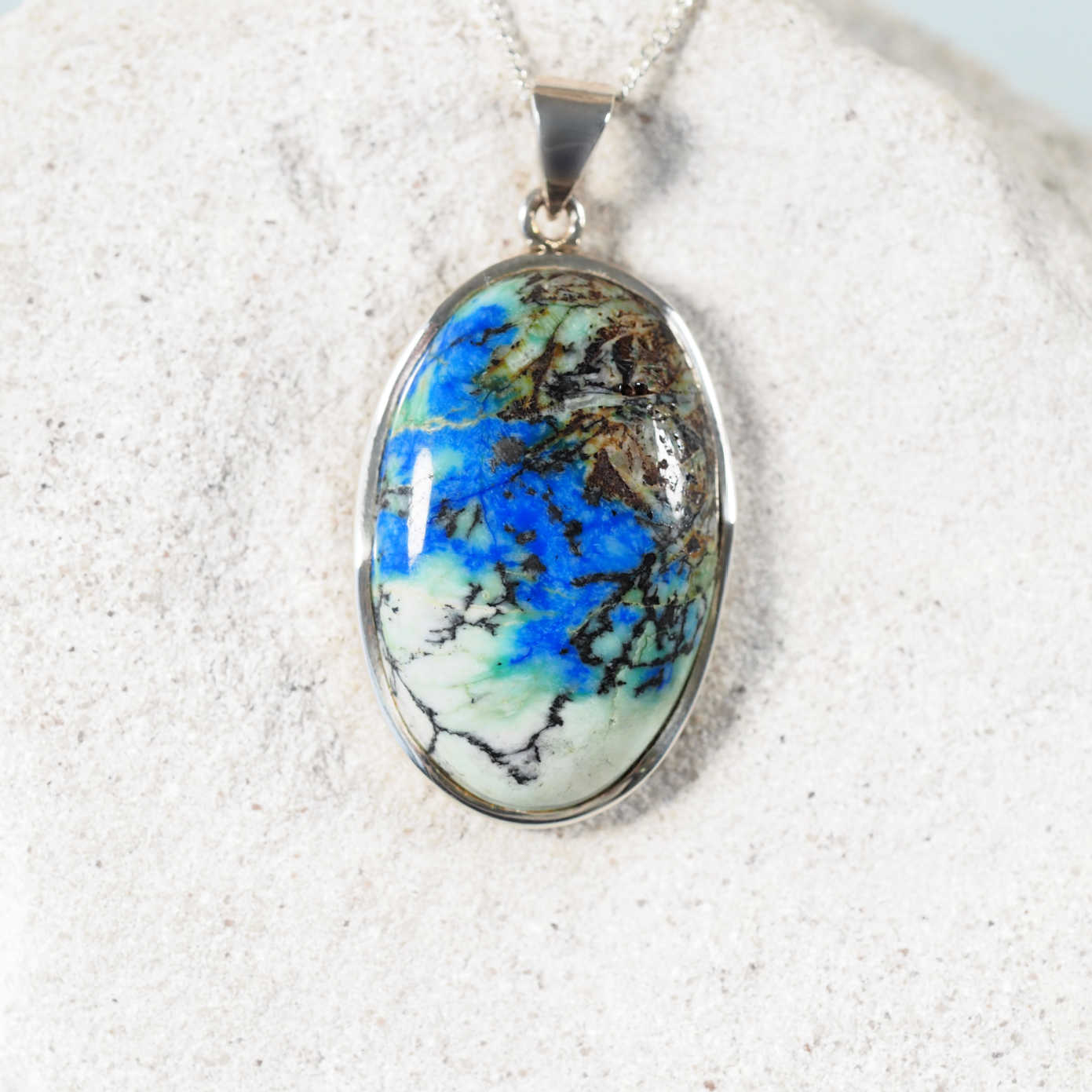 'Kira' Azurite Chrysocolla pendant with oval cabochon set in polished silver