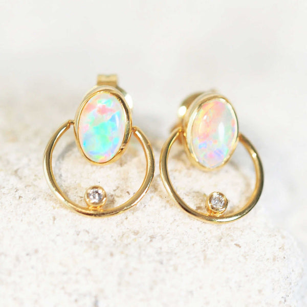 australian opal earrings set with two south australian crystal opals