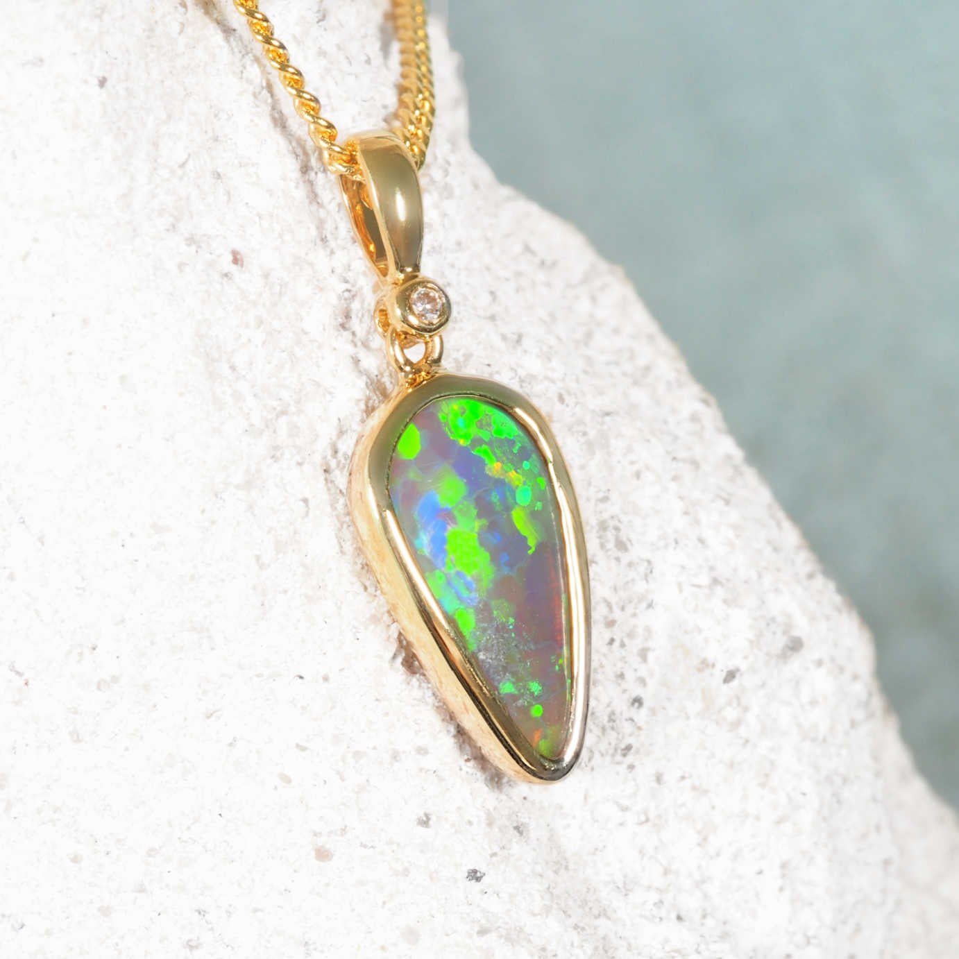 18ct yellow gold Kristina crystal opal pendant with teardrop Lightning Ridge black opal and diamond accent
