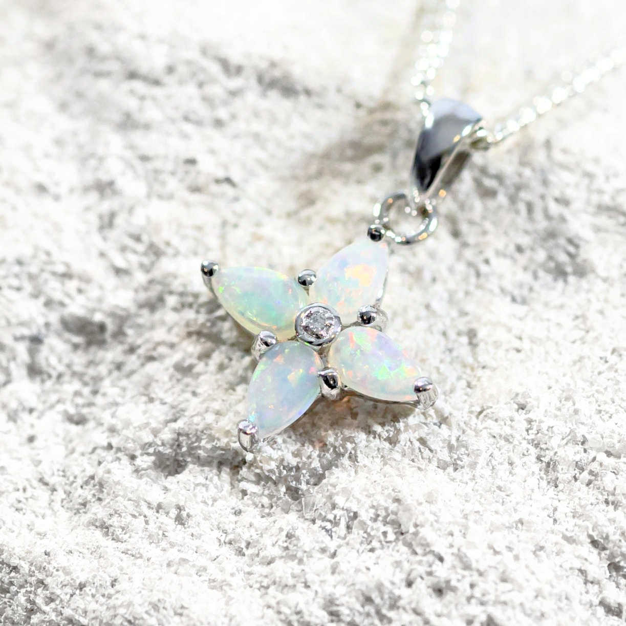 colourful opal pendant set in sterling silver