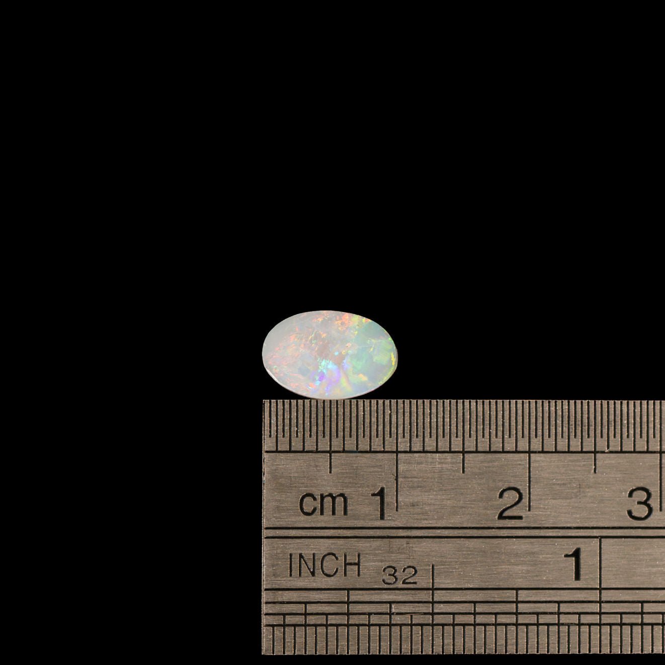 Oval-shaped crystal opal from Lightning Ridge, showcasing vibrant multi-colour flashes and a translucent body