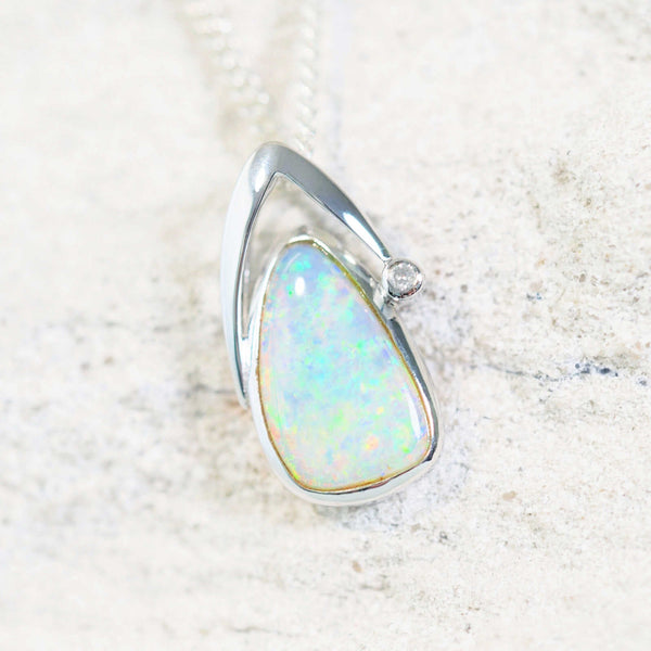 crystal opal pendant set in white gold