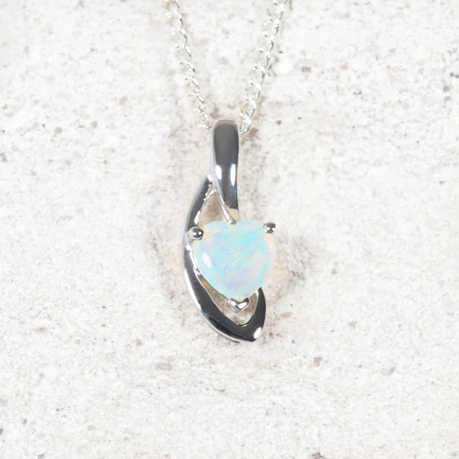 green heart opal pendant in white gold