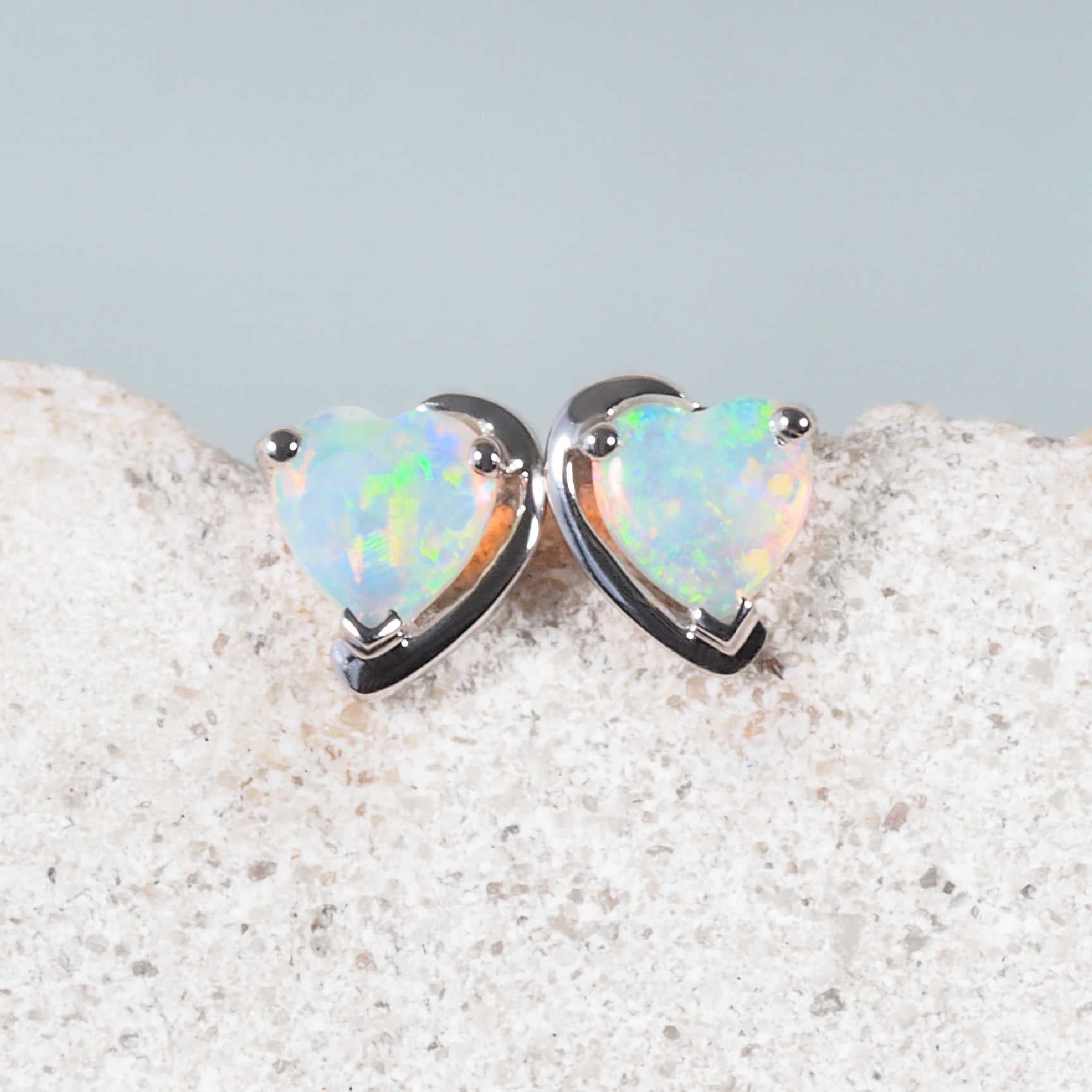 Lovina heart-shaped Australian crystal opal earrings in polished 14ct white gold