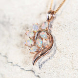 rose gold opal necklace set with seven marquise shaped, colourful australian opals