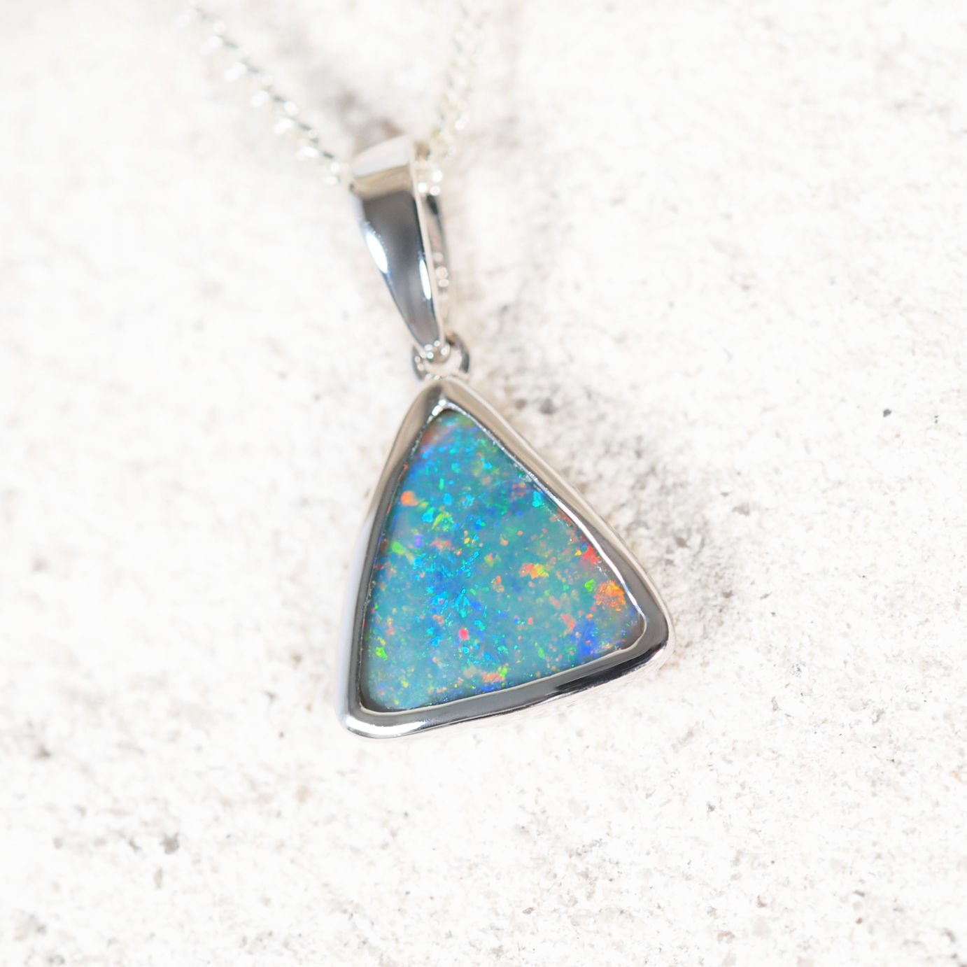 ‘Lumira’ 14ct white gold black opal pendant – solid Lightning Ridge opal with diamond accents by Black Star Opal