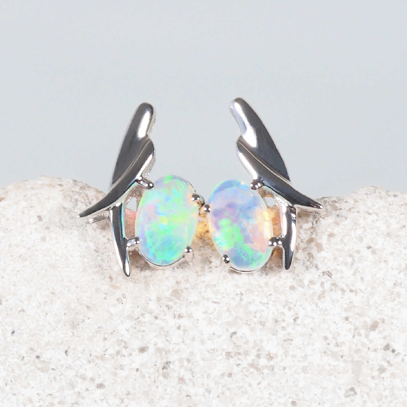 Lunessa 14ct white gold stud earrings with vivid green South Australian crystal opals
