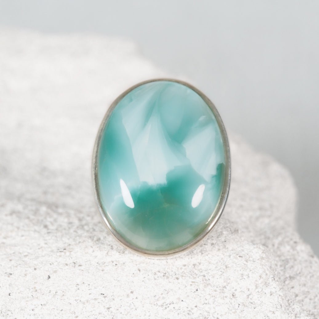 Elegant oval green Larimar cabochon ring set in polished silver, unique gemstone design
