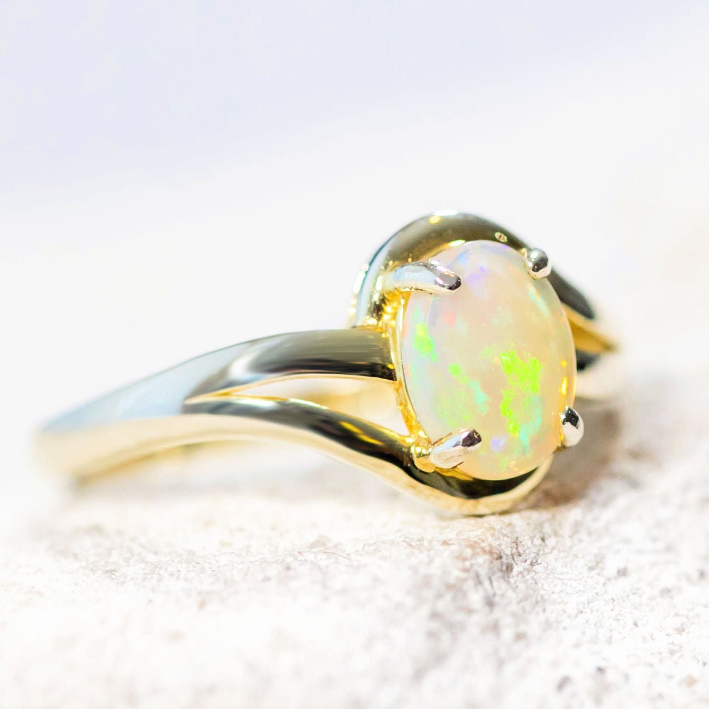 opal ring set with a white opal set in gold plated silver 'margaux'