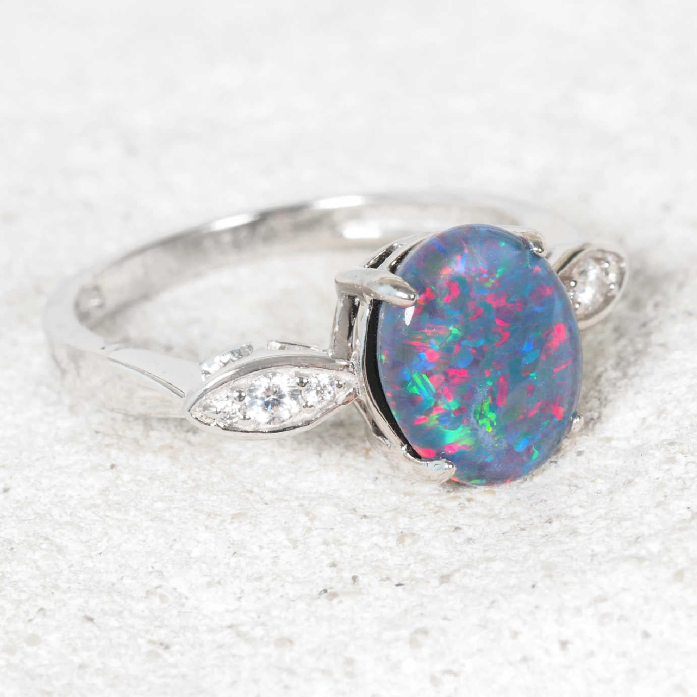 Silver opal ring set with an Australian triplet opal
