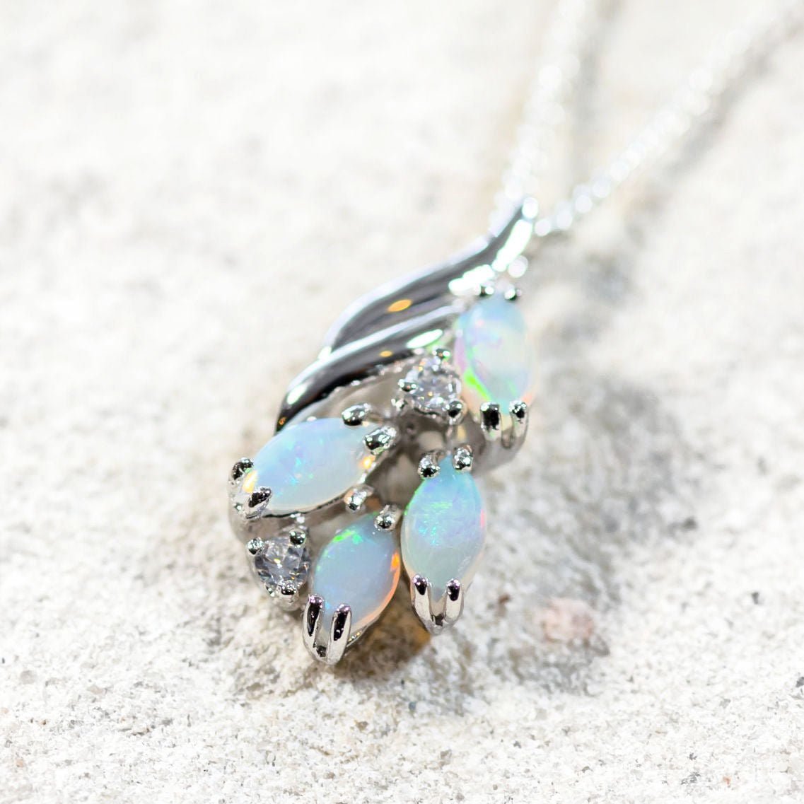 blue crystal opal pendant set with crystals