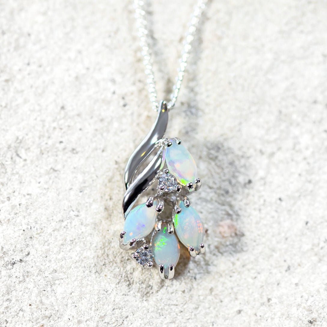 marquise blue opal pendant set in sterling silver