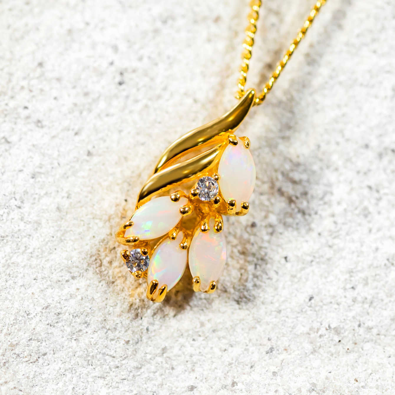 colourful opal pendant set in gold plated silver