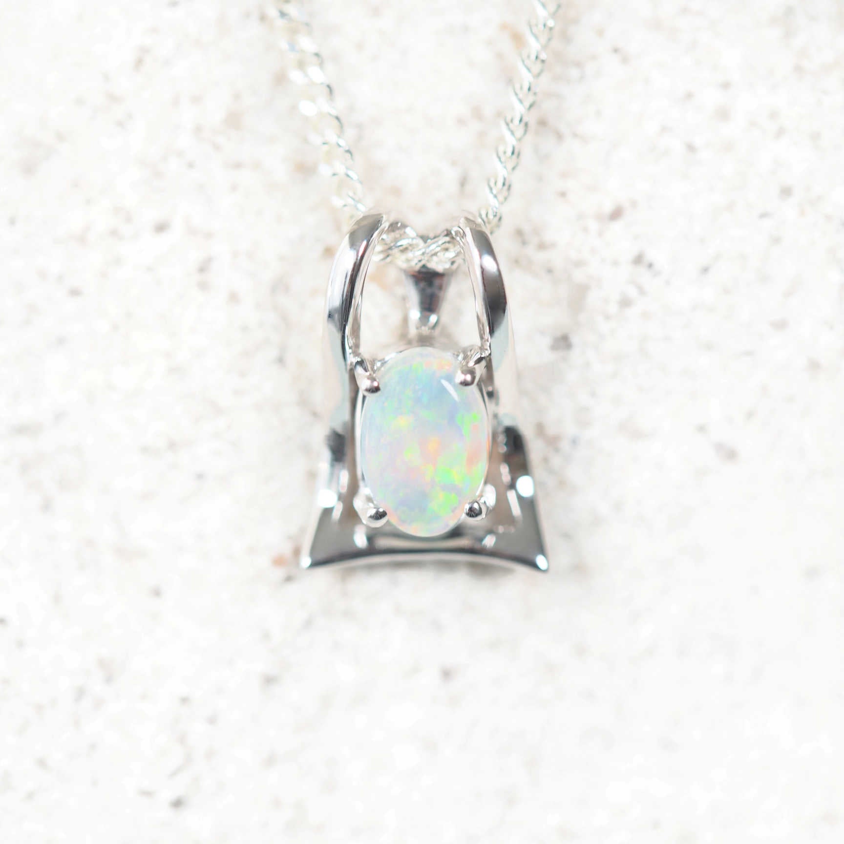 green crystal opal pendant set in 9ct white gold