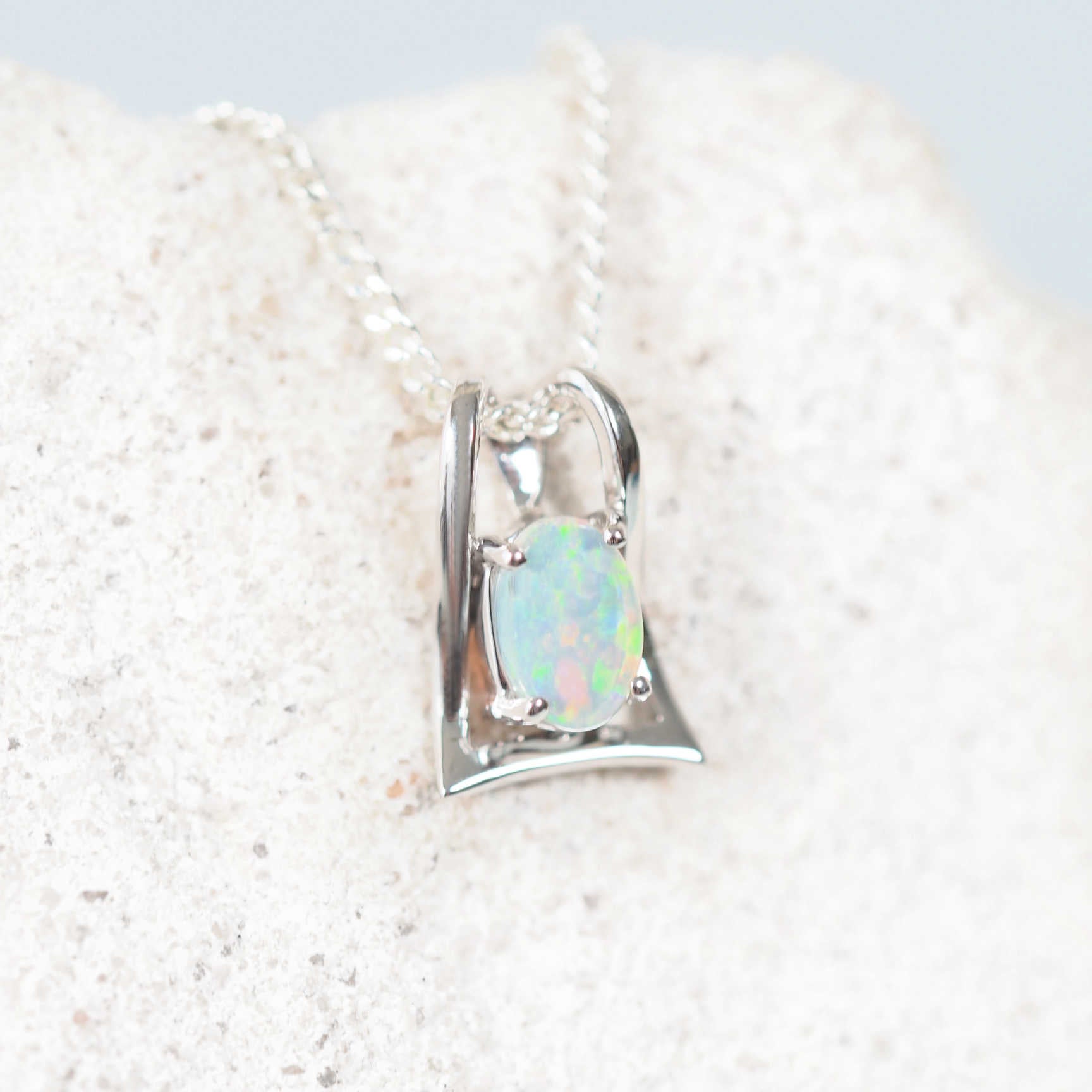 green crystal opal pendant set in white gold